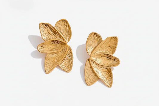 Aretes media flor